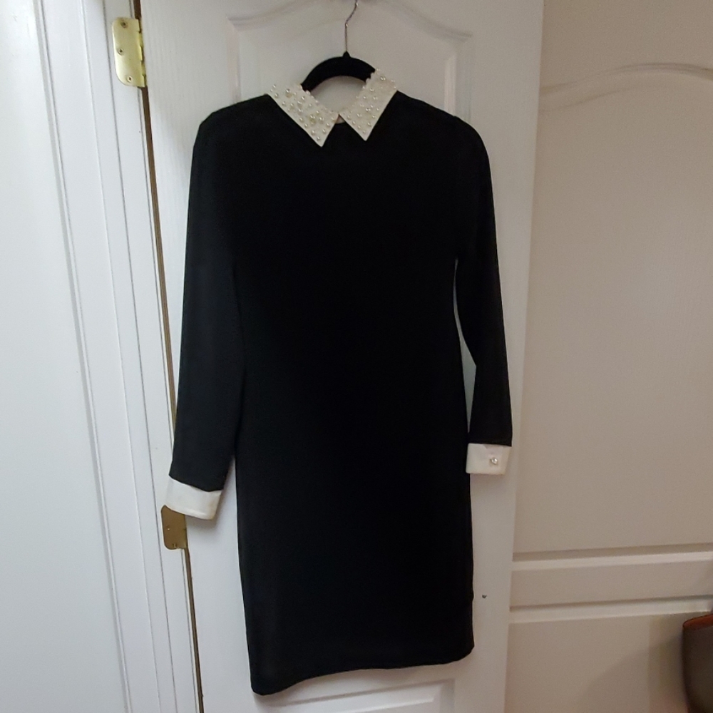 Black dress with pearl collar